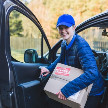 Courier picking up items from Toronto auction house